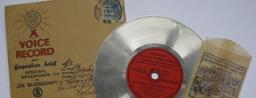 Typical aluminium 'message' disc and envelope